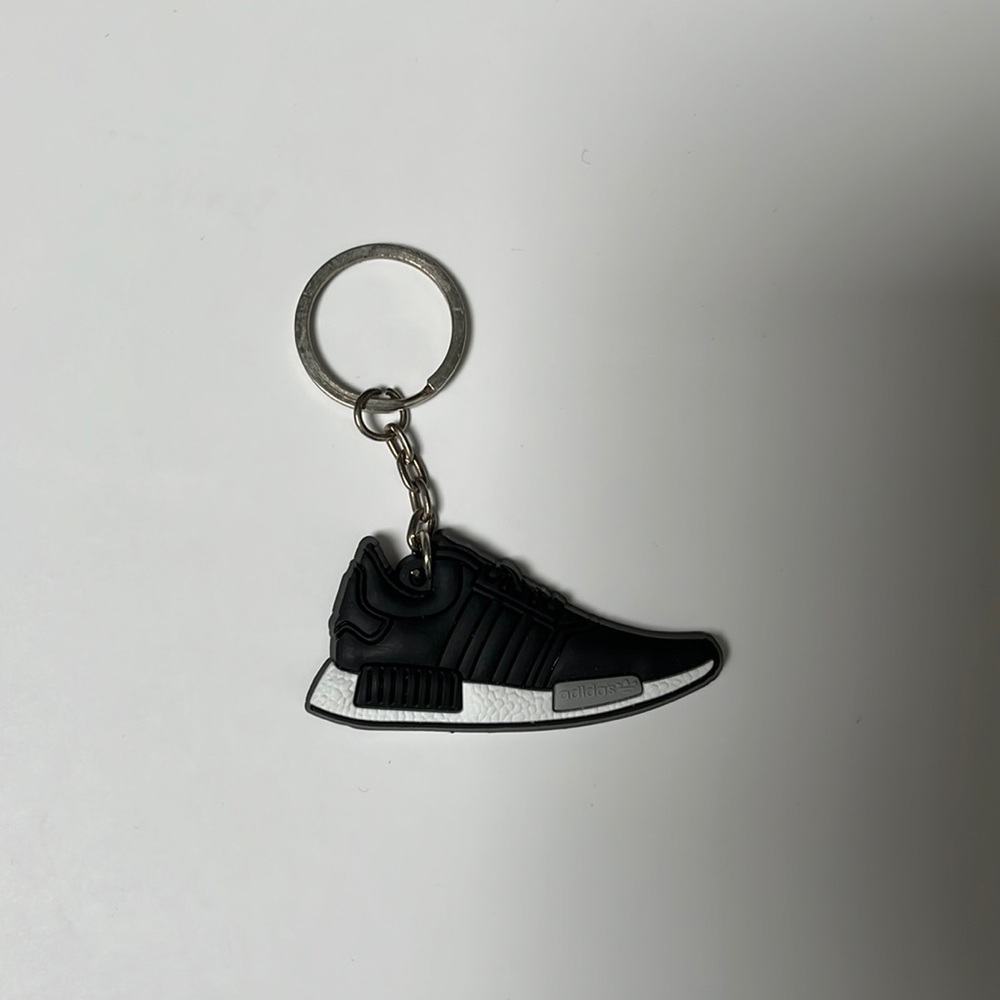 Black and white adidas NMD key chain